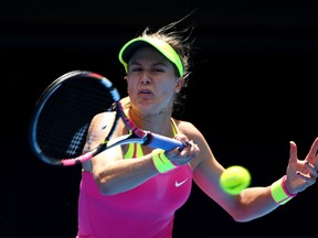 MELBOURNE, AUSTRALIA - JANUARY 25:  Eugenie Bouchard of Canada plays a forehand in her fourth round match against Irina-Camelia Begu of Romania during day seven of the 2015 Australian Open at Melbourne Park on January 25, 2015 in Melbourne, Australia.  (Photo by Clive Brunskill/Getty Images)