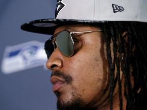 Seattle Seahawks' Marshawn Lynch attends a news conference for NFL Super Bowl XLIX football game, Wednesday, Jan. 28, 2015, in Phoenix. The Seahawks play the New England Patriots in Super Bowl XLIX on Sunday, Feb. 1, 2015. (AP Photo/Matt York)