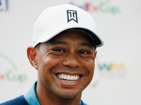 SCOTTSDALE, AZ - JANUARY 27:  Tiger Woods chats with the media during a practice round prior to the start of the Waste Management Phoenix Open at TPC Scottsdale on January 27, 2015 in Scottsdale, Arizona.  (Photo by Scott Halleran/Getty Images)