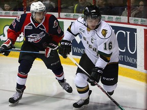 Spitfires Jalen Chatfield watches London Knights Max Domi in OHL action at WFCU Centre Thursday January 29, 2015. (NICK BRANCACCIO/The Windsor Star)