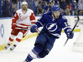 Tampa Bay's Cedric Paquette, right, reacts after scoring his third goal against the Detroit Red Wings Thursday in Tampa, Fla. (AP Photo/Chris O'Meara)