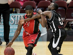 Seen in action with Mississauga, guard Omar Strong, at right, led the Windsor Express with 22 points on Tuesday in a road win over the St. John's Edge.