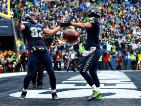 Luke Willson #82 of the Seattle Seahawks celebrates after scoring on a two point conversion during the fourth quarter of the 2015 NFC Championship game against the Green Bay Packers at CenturyLink Field on January 18, 2015 in Seattle, Washington.  (Tom Pennington/Getty Images)