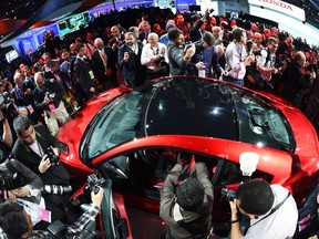 Acura reveals its new NSX at The North American International Auto Show in Detroit, Michigan, on January 12, 2015. The annual car show takes place amid a surging economy, more jobs and cheap gas, a trifecta of near-perfect conditions for the US auto industry. (JEWEL SAMAD/AFP/Getty Images)