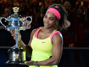 Serena Williams celebrates after winning her women's singles final match against Russia's Maria Sharapova at the  Australian Open tennis tournament in Melbourne on January 31, 2015. (MAL FAIRCLOUGH/AFP/Getty Images)