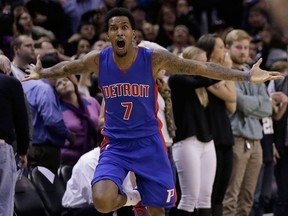 Detroit's Brandon Jennings celebrates after he scored the game-winner against the San Antonio Spurs Tuesday.  (AP Photo/Eric Gay)