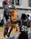 St. Joseph’s Marc Pineault, left, and Lowhya Lako defend against Matt Broderick of St. Anne in high school basketball Thursday, Jan. 8, 2015. (NICK BRANCACCIO/The Windsor Star)