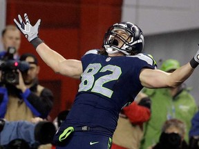 Seattle Seahawks tight end Luke Willson (82) celebrates after catching a 25-yard touchdown pass against the Carolina Panthers during the second half of an NFL divisional playoff football game in Seattle, Saturday, Jan. 10, 2015. (AP Photo/Elaine Thompson)