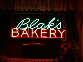 The neon sign in the window of Blak's Bakery at 1022 Langlois Ave. Photographed on Dec. 2, 2014. (Jason Kryk / The Windsor Star)