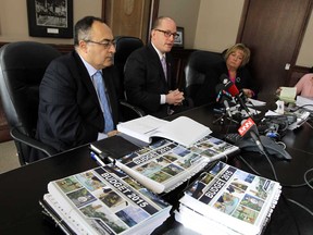 Treasurer Onorio Colucci, Mayor Drew Dilkens and CAO Helga Reidel (left to right) face the media during a press conference to announce the 2015 budget at city hall in Windsor on Monday, January 5, 2014.   (TYLER BROWNBRIDGE/The Windsor Star)