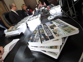 Copies of the budge are seen during a press conference to announce the 2015 budget at city hall in Windsor on Monday, January 5, 2015.   (TYLER BROWNBRIDGE/The Windsor Star)