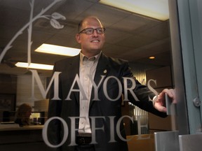 Drew Dilkens at the door to the Windsor mayor's office on Oct. 28, 2014. (Jason Kryk / The Windsor Star)