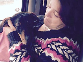 Tina Hunter Beaudoin holds Grace the dog on the way to the Windsor Essex Humane Society, Jan. 3, 2015. Grace was the last of four dogs, allegedly abandoned, to be rescued by volunteers over the course of four days. (Courtesty of Shannon Belanger Bulmer)