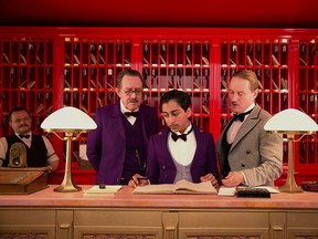 This image released by Fox Searchlight shows Tom Wilkinson, Tony Revolori, center, and Owen Wilson, right,  in "The Grand Budapest Hotel ." (AP Photo/Fox Searchlight)