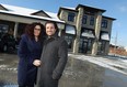 Hoda and Andre Abouasli are photographed in front of their salon which was derailed by a fire a on July 25, 2013. The two are pictured in this Jan. 6, 2015 file photo.