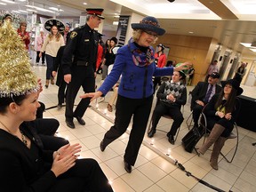 Models work the runway during a kick-off for the annual Hats On for Healthcare at Windsor Regional Hospital MET campus in Windsor on Tuesday, January 13, 2015. This year's event will take place on February 11th and will benefit the Renal Dialysis Program at the Ouellette Campus. Organizations are encourage to participate by asking members or employees to donate a "toonie" in exchange for wearing a hat.     (TYLER BROWNBRIDGE/The Windsor Star)