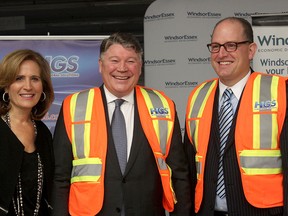 andra Pupatello, WindsorEssex Economic Development Corporation CEO, Ross Beattie, HGS Canada president and CEO and Drew Dilkens, Windsor mayor, pose at the future location of HGS Canada in Windsor, Ont. Tuesday, Jan. 13, 2014. HGS Canada announced it Tuesday it would be opening its new contact centre location this year. (DYLAN KRISTY/The Windsor Star)