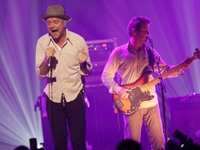 The Tragically Hip frontman Gordon Downie and bass player Gord Sinclair perform with the band at Caesars Windsor, Saturday, Jan. 17, 2015. (RICK DAWES/The Windsor Star)