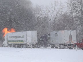 Flames rise from vehicles involved in a massive crash on I-94 in Kalamazoo County on Jan. 9, 2015. (Twitpic: MLive)