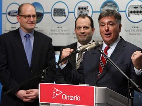 Ontario Finance Minister Charles Sousa (right) is joined by Mayor Drew Dilkens and Nemak technical manager Glenn Byczynski (centre) during an announcement at the Nemak plant in Windsor on Monday, January 19, 2015. The plant is planning an expansion that will create 80 new jobs and begin shipping parts to China for a new GM product.       (TYLER BROWNBRIDGE/The Windsor Star)