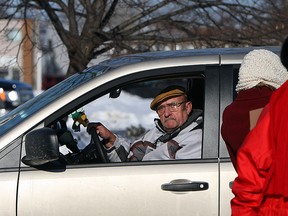 A driver voices his displeasure at nurses from the Ontario Nurses Association as they block cars from entering the parking lot of the strip mall at Tecumseh Road and Rivard Avenue in Windsor on Friday, January 30, 2015. An estimated 3,000 Community Care Access Centre nurses, including about 260 members in Windsor and Essex County, are on strike and want similar wage increase to those of other nurses in other sectors. (TYLER BROWNBRIDGE/The Windsor Star)