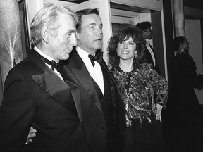 In this Feb. 18, 1985 file photo, Jill St. John, right, with Robert Wagner, center, and Rod McKuen, left, attend a party for "Night of 100 Stars II," in New York. McKuen, the husky-voiced "King of Kitsch" whose music and verse recordings won him an Oscar nomination and made him one of the best-selling poets in history, has died on Thursday, Jan. 29, 2015. He was 81. (AP Photo/Rene Perez, File)