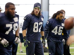 LaSalle's Luke Willson, centre, lines up for a drill at practice  last week in Renton, Wash. (Elaine Thompson/The Associated Press)