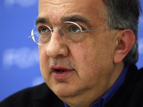 Fiat Chrysler Chief Executive Sergio Marchionne speaks with reporters on the day one of the North American International Auto Show at Cobo Hall in Detroit, Michigan on Monday, January 12, 2015.    (TYLER BROWNBRIDGE/The Windsor Star)