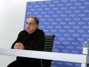Fiat Chrysler Chief Executive Sergio Marchionne speaks with reporters on the day one of the North American International Auto Show at Cobo Hall in Detroit, Michigan on Monday, January 12, 2015.    (TYLER BROWNBRIDGE/The Windsor Star)