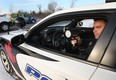 Windsor Police Const. Joe Bohdal from the traffic unit uses a radar gun while looking for speeders along Division Rd. on Tuesday, Jan. 6, 2015, in Windsor, ON. (DAN JANISSE/The Windsor Star)