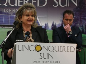Janice McMichael-Dennis, president and CEO of Bluewater Power, speaks as Sean Moore listens during a press conference at Unconquered Sun in Windsor on Thursday, January 29, 2015. Bluewater Power from Sarnia has purchased Unconquered Sun for an undisclosed amount and hopes to expand the business.     (TYLER BROWNBRIDGE/The Windsor Star)