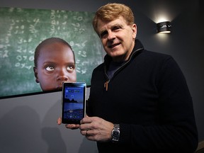 Retired Windsor Star reporter Don Lajoie is photographed with the Haitian made Surtab at the Windsor Star offices in Windsor on Tuesday, January 27, 2015.       (TYLER BROWNBRIDGE/The Windsor Star)