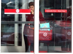 A shopper is shown at the Target store at the Devonshire Mall on Thursday, Jan. 15, 2015, in Windsor, ON. The company announced that it close all their stores in Canada.  (DAN JANISSE/The Windsor Star