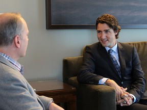 Liberal Leader Justin Trudeau speaks to Windsor Star reporter Craig Pearson at his hotel room at Caesars Windsor in Windsor, Ont. on Thursday, Jan. 22, 2015. (DYLAN KRISTY/The Windsor Star)
