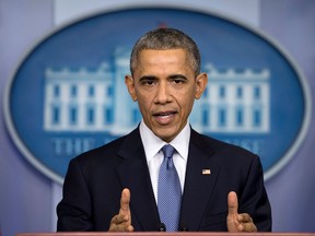 In this Dec. 19, 2014 file photo, President Barack Obama speaks during a news conference in the Brady Press Briefing Room of the White House in Washington to talk about successes in 2014, citing lower unemployment, a rising number of Americans covered by health insurance, and an historic diplomatic opening with Cuba.  The Obama administration is putting a large dent in the U.S. embargo against Cuba as of Friday, significantly loosening restrictions on American trade and investment. The new rules also open up the communist island to greater American travel and allow U.S. citizens to start bringing home small amounts of Cuban cigars after more than a half-century ban. (AP Photo/Carolyn Kaster, File)