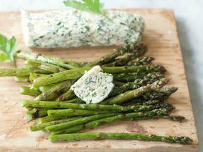 Asparagus, above with lemon butter, contains two important beneficial bacteria -- bifidobacteria and lactobacilli. (Associated Press files)