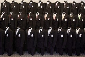 WINDSOR, ON. MAR 28. In this file photo, it's much like March of the Penguins as row upon row of tuxedo jackets highlight the vest and tie options at Merlo Formal Rental and Sales.       (Windsor Star - Tyler Brownbridge)