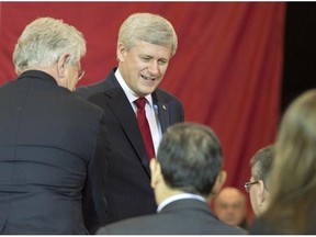 Prime Minister Stephen Harper greets supporters after making an announcement in Richmond Hill, Ont., on Friday, Jan. 30, 2015. Harper spoke about a newly tabled anti-terrorism legislation that would give Canada's spy agency more power to thwart a suspected extremist's travel plans, disrupt bank transactions and covertly interfere with radical websites.
Photograph by: Frank Gunn/The Canadian Press Files