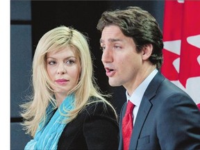 Former Conservative MP Eve Adams, left, is joined by Liberal Leader Justin Trudeau as she announces in Ottawa on Monday that she is leaving the Conservative party to join the Liberal Party of Canada.
(Justin Tang, The Canadian Press)