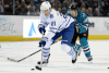 Toronto’s James van Riemsdyk, right, is checked by San Jose’s Logan Couture Tuesday in San Jose. (Photo by Thearon W. Henderson/Getty Images)