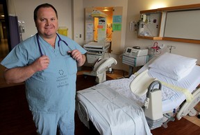 Dr. Bill Mundle poses in Windsor Regional Hospital's maternity ward  Feb. 13, 2015.