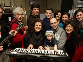 In this file photo, the Palazzolo family members prepare for a weekend concert.  Standing are: Nino Palazzolo Jr, left, Nino Palazzolo Sr., Peter Palazzolo, Bryan Connel, Maria Connel, Christina Stein, Christine Palazzolo, right.  On keyboard are: RoseAnne Palazzolo-Barrette, Chase Fabischek, Jeff Fabischek and Tina Fabischek, right.  The Palazzolo family held a concert at Giovanni Caboto Club of Windsor. (NICK BRANCACCIO/The Windsor Star)