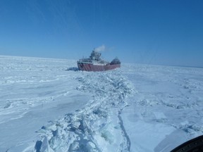 The Arthur M. Anderson is beset in ice near Conneaut Harbour, Ohio. (Handout courtesy of The Canadian Coast Guard.)