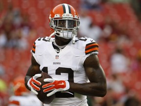 FILE - In this Aug. 18, 2014, file photo, Cleveland Browns wide receiver Josh Gordon warms up before an NFL preseason football game against the Washington Redskins in Landover, Md. Gordon's 10-game suspension for repeated violations of the NFL's drug policy is set to end Monday, Nov. 17 when the Pro Bowler will be allowed to rejoin his teammates after being exiled since September. (AP Photo/Evan Vucci, File)