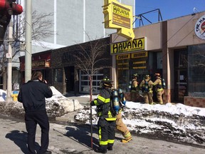 Windsor firefighters on the scene of a downtown blaze on Feb. 23, 2015. (Dan Janisse/The Windsor Star)