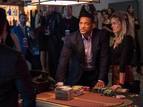 Will Smith, left, and Margot Robbie star in Focus Photograph by: Warner Bros. Pictures, Postmedia News