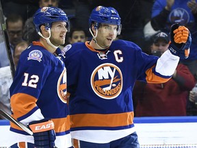 Ex-Spit Josh Bailey, left, celebrates a goal with John Tavares against the Boston Bruins at Nassau Coliseum.(AP Photo/Kathy Kmonicek)