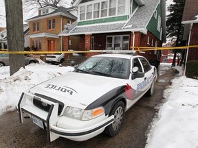 Police investigate a shooting in the 1200 block of Parent Avenue on Sunday, Feb. 8, 2015. (DAX MELMER/The Windsor Star)