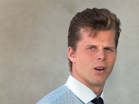 Former Windsor Spitfires player Ben Johnson stands outside the courthouse in June 2014. (Dan Janisse / The Windsor Star)