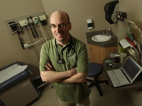 Files: Dr. John Day in his Tecumseh office on Friday, April 15, 2011.            (TYLER BROWNBRIDGE / The Windsor Star)